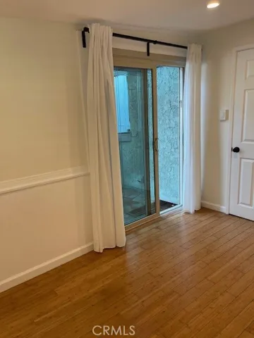 Second bedroom with door to back yard.