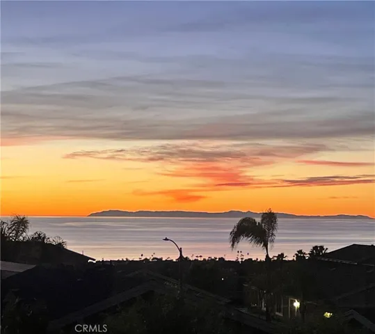 ocean view from living room, dining room, kitchen and primary bedroom