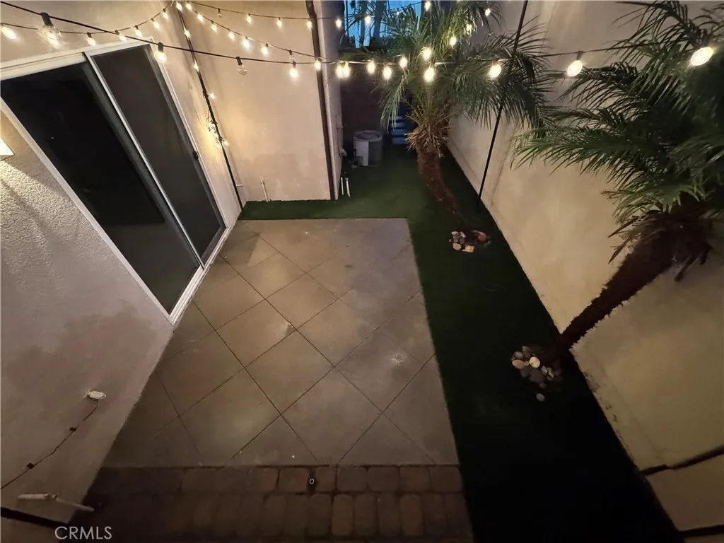 Rear yard/patio twilight (top angle)