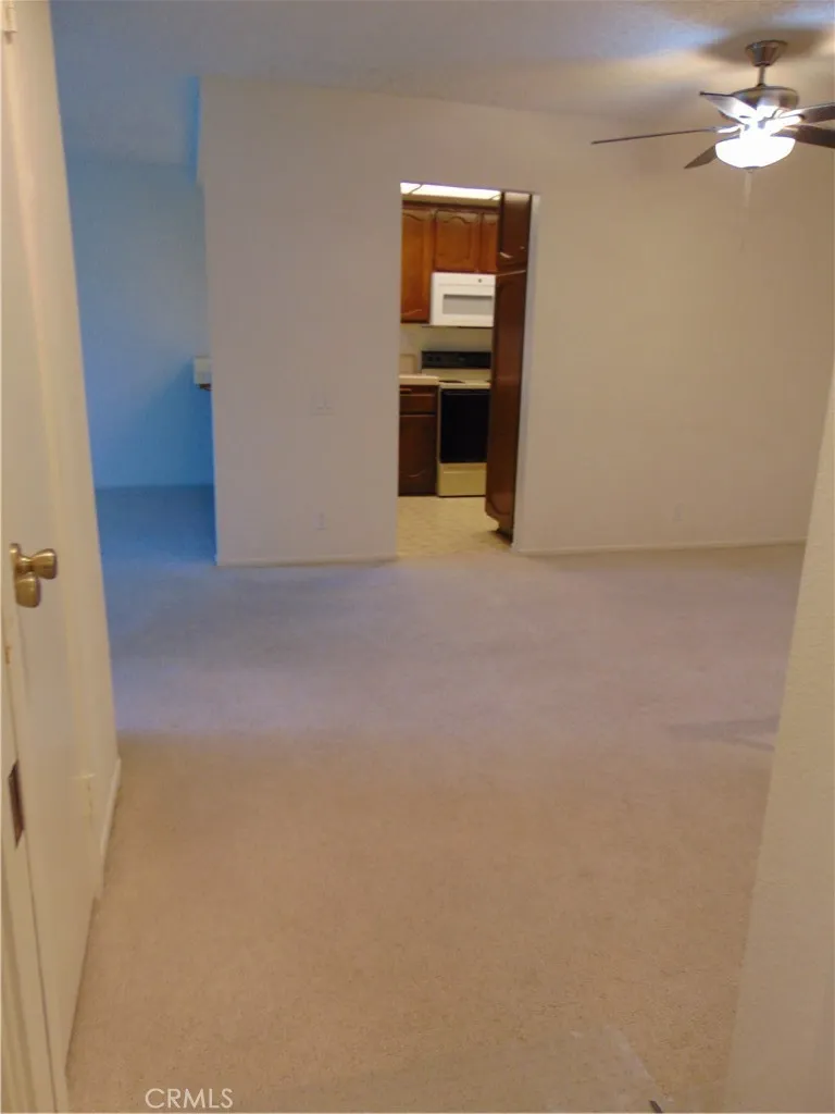 From the bedroom hallway toward the kitchen.
