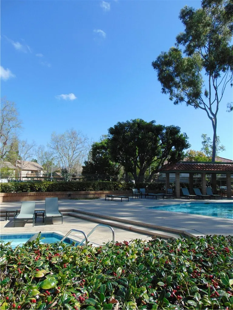 Pool below the unit and to the left adds to beautiful surroundings and a refreshing place to enjoy the pool or sunbathing