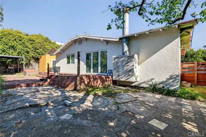 Spacious decking and garden fronts Amoroso Pl.