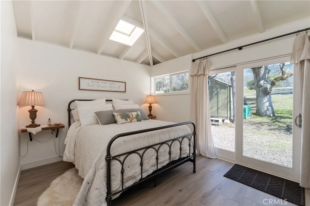 Bedroom filled with natural light and direct exterior access
