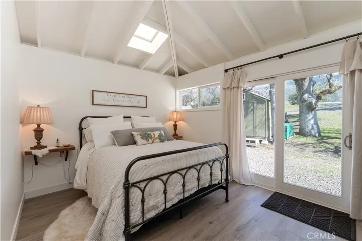 Bedroom filled with natural light and direct exterior access
