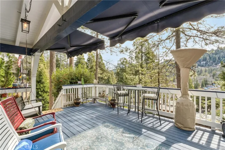 Front deck/porch with retractable awnings