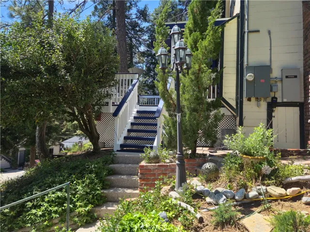 Side yard with stairs to front deck
