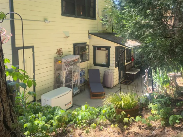 Large fenced patio with generator