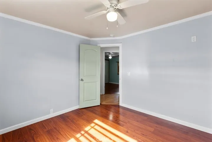Bright bedroom with ceiling fan
