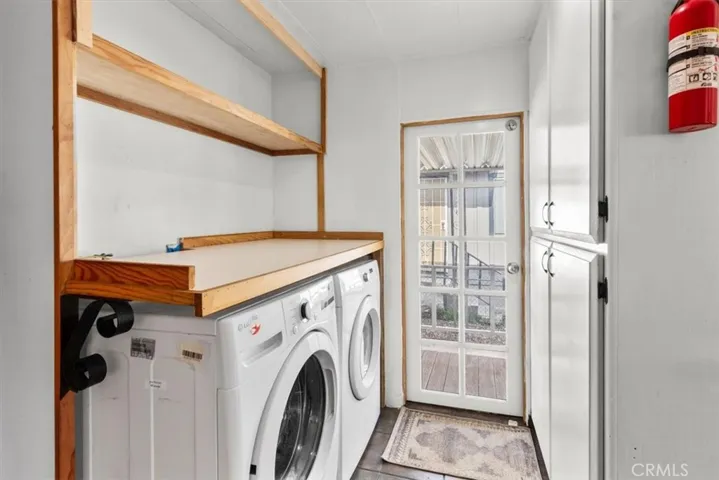 Laundry room with washer and dryer