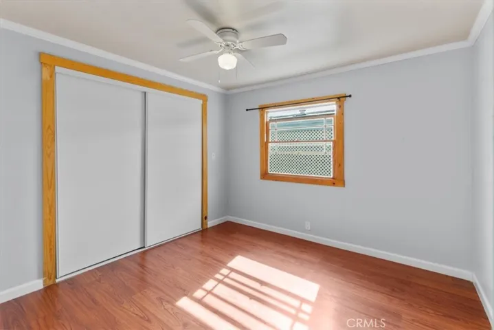 Bright bedroom with ceiling fan