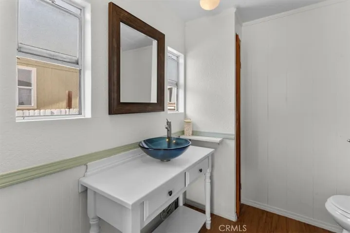 Half bath with vessel sink