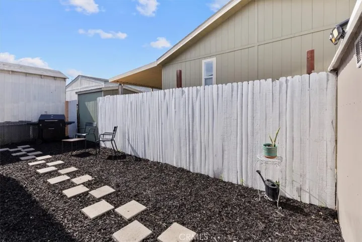 Private patio with fenced yard