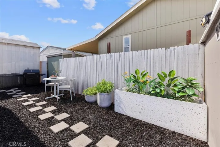 Private patio with fenced yard