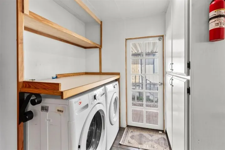 Laundry room with washer and dryer