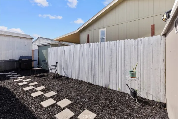 Private patio with fenced yard