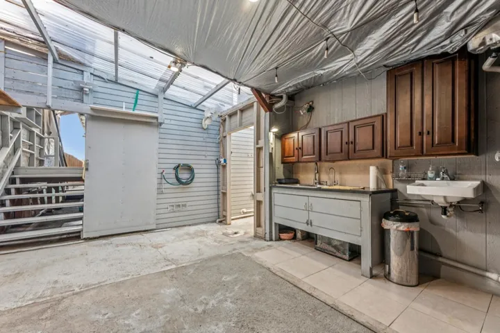 Garage featuring a sink