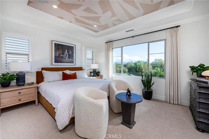 Primary Bedroom with coffered ceilings in Model Home