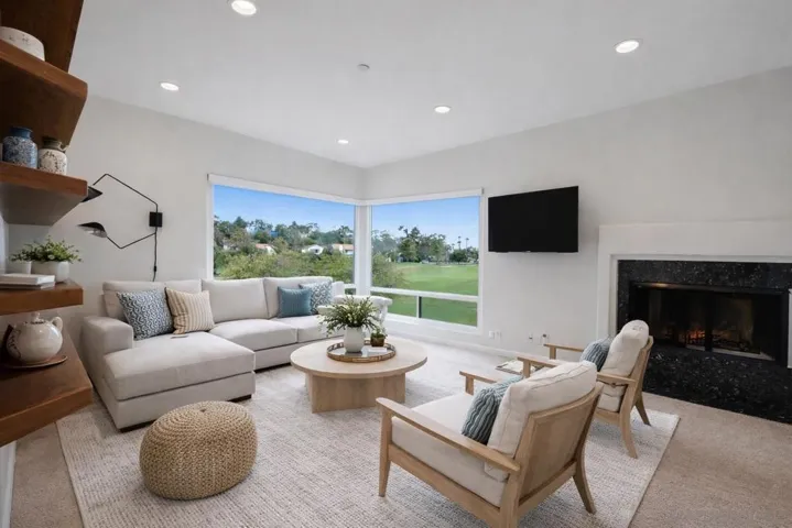 This Living room image has been virtually staged. Furniture and decor are digital renderings and not included in the sale.