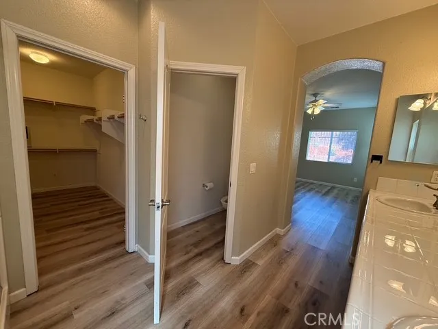 primary bedroom bath with large walk-in closet