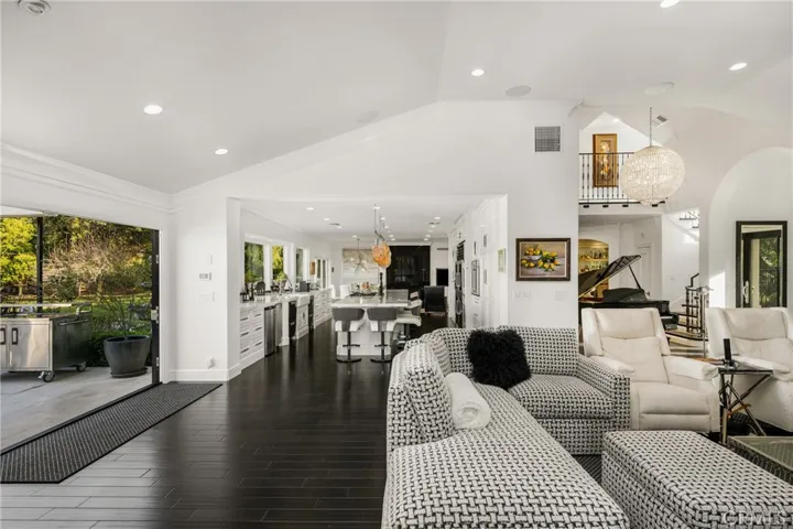 Family room/kitchen with the second fireplacea the end