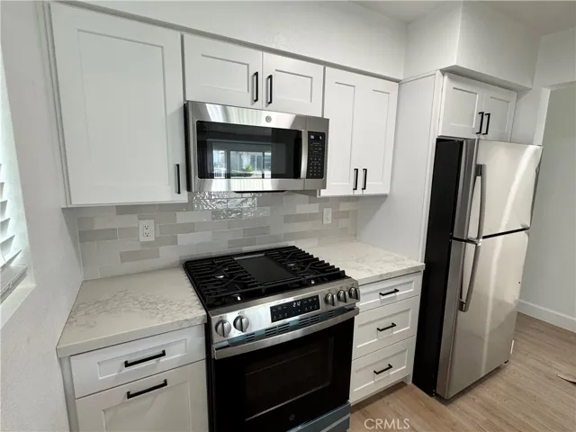 Remodeled Kitchen with stainless-steel appliances.