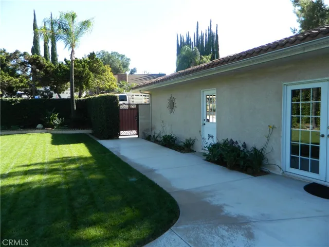 Rear Gate to Driveway and Garage