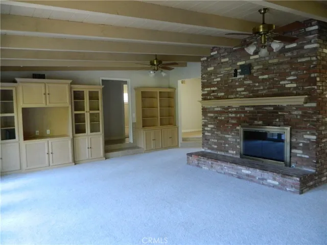 Huge Family Room with Built-in Storage & Fireplace