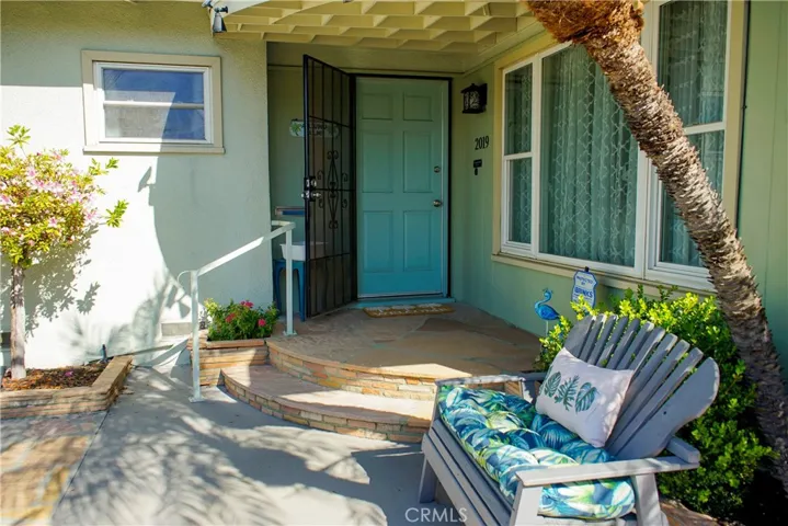 Front window and stone entry