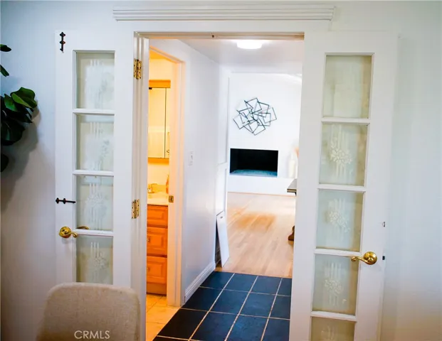 Private primary suite with fireplace