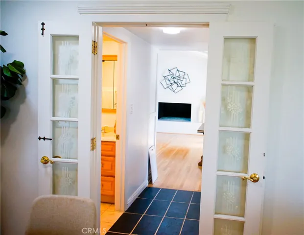 Private primary suite with fireplace