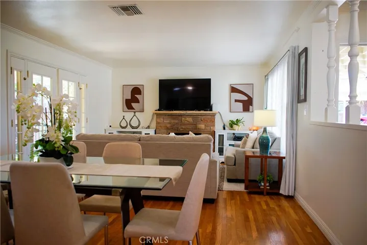 Beautiful French doors and picture window. Fireplace with tempered glass