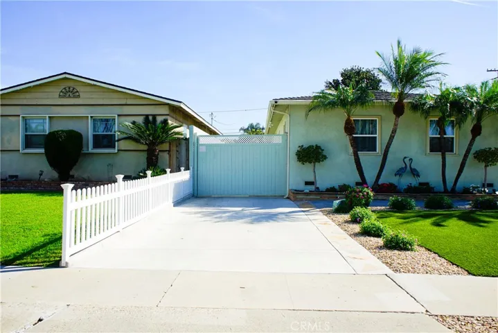 LONG PRIVATE DRIVEWAY EXTENDS PAST THE ELECTRIC GATE