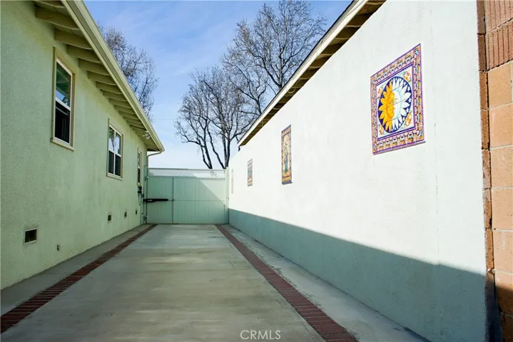 Dream driveway   Custom murals on privacy wall