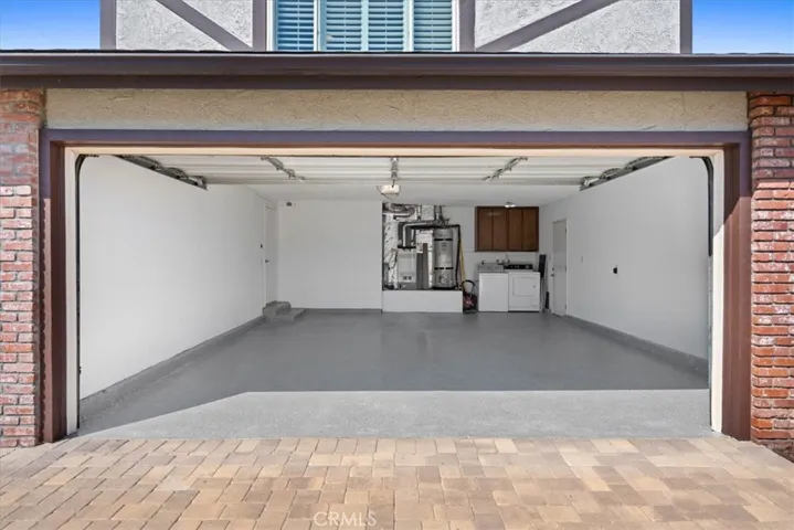2 car garage w/ direct access : side by side washer/dryer : EPOXY flooring.