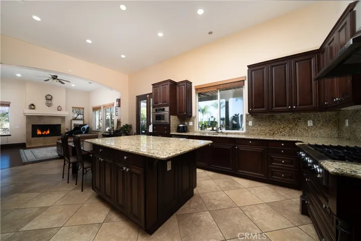 Beautiful kitchen and eating area opens into the backyard and Family Room.