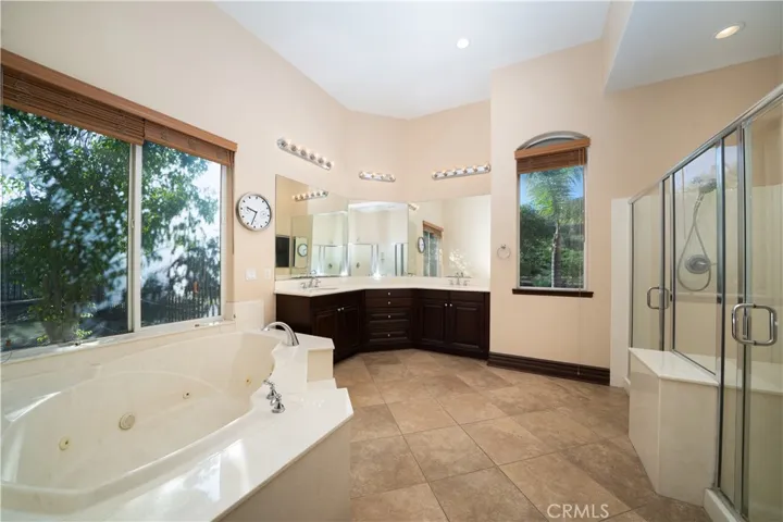Ensuite has a hot tub and two separate showers