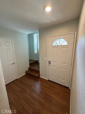 Interior Entryway with storage closet and access to Garage