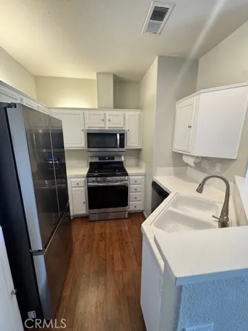 Well Equipped Kitchen has New Appliances and is open to the Living Areas