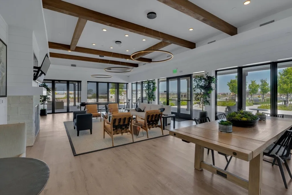 community lobby with recessed lighting and beamed ceiling