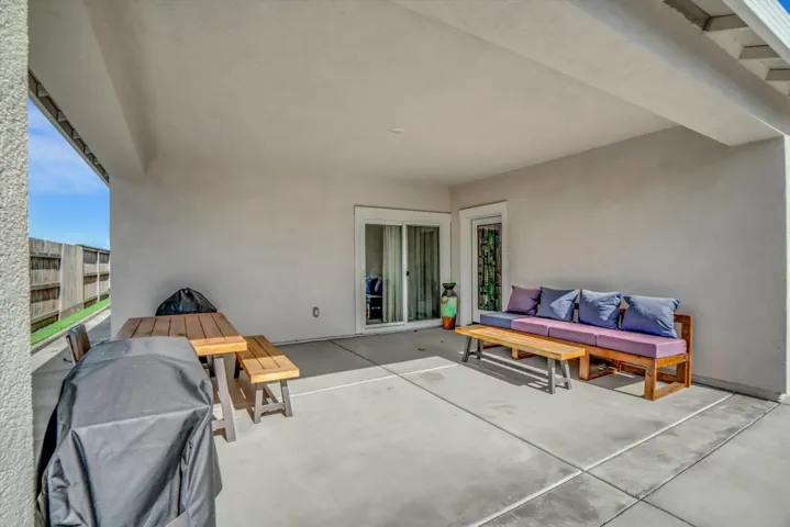 view of patio featuring grilling area and outdoor lounge area