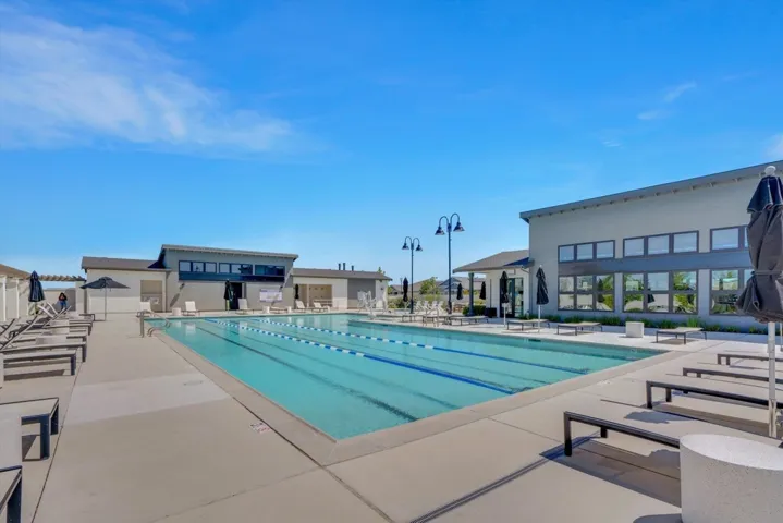 community pool with a patio
