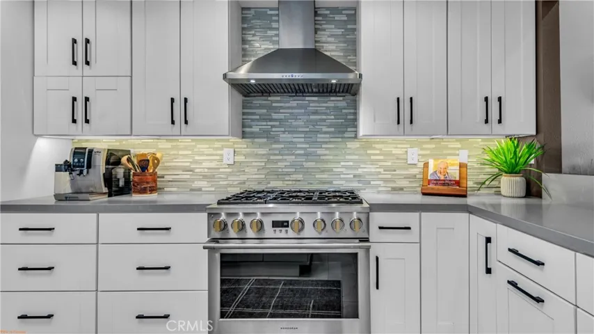 All new cabinets, pro range and hood