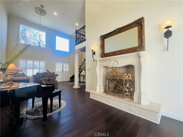 Living Room, enlarged windows providing plenty of natural light.