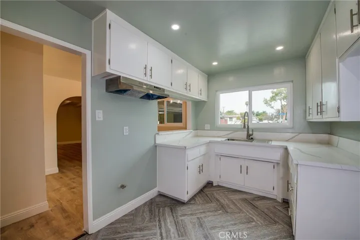 Beautiful kitchen counters and floors.