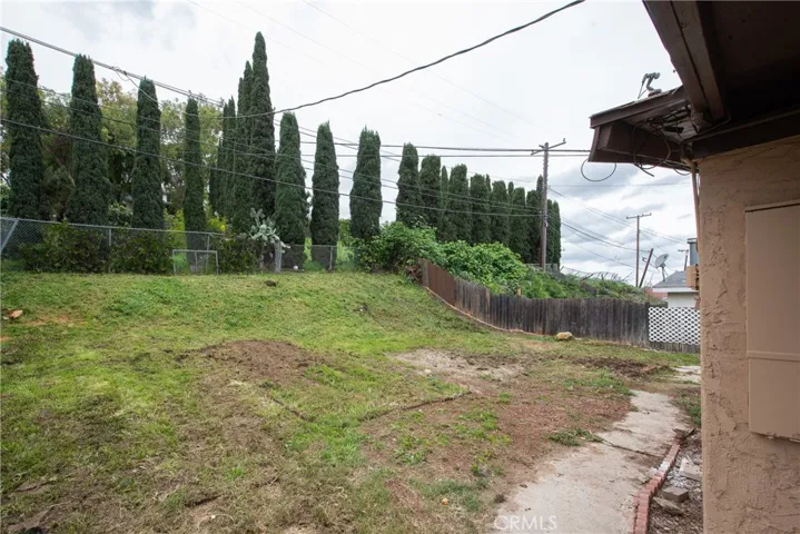 Back yard waiting for a swing set.