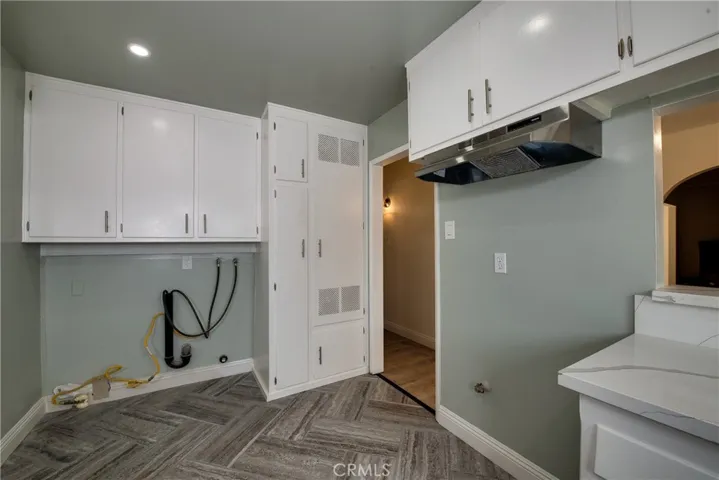Laundry area in the kitchen. Convenience!