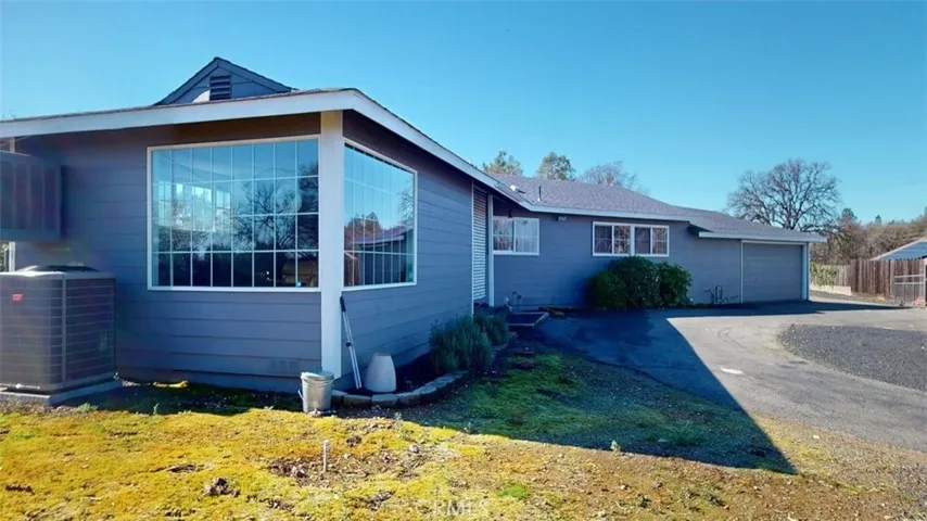 Standing at side end of house