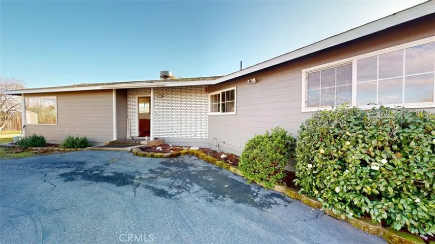In Circle driveway looking at front door.