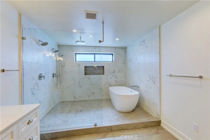 Primary suite bathroom Walk-in 
Shower and custom tub