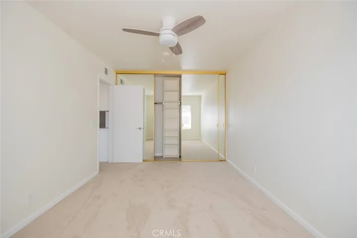 Secondary bedroom with Storage & Mirrors